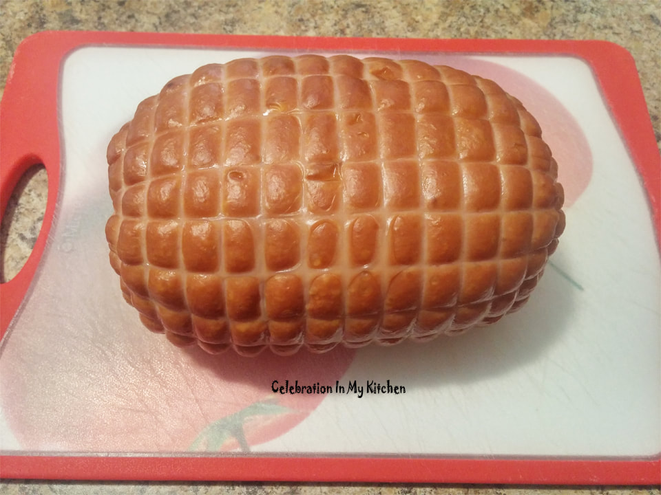 Baked Ham With Spiced Maple Honey Glaze